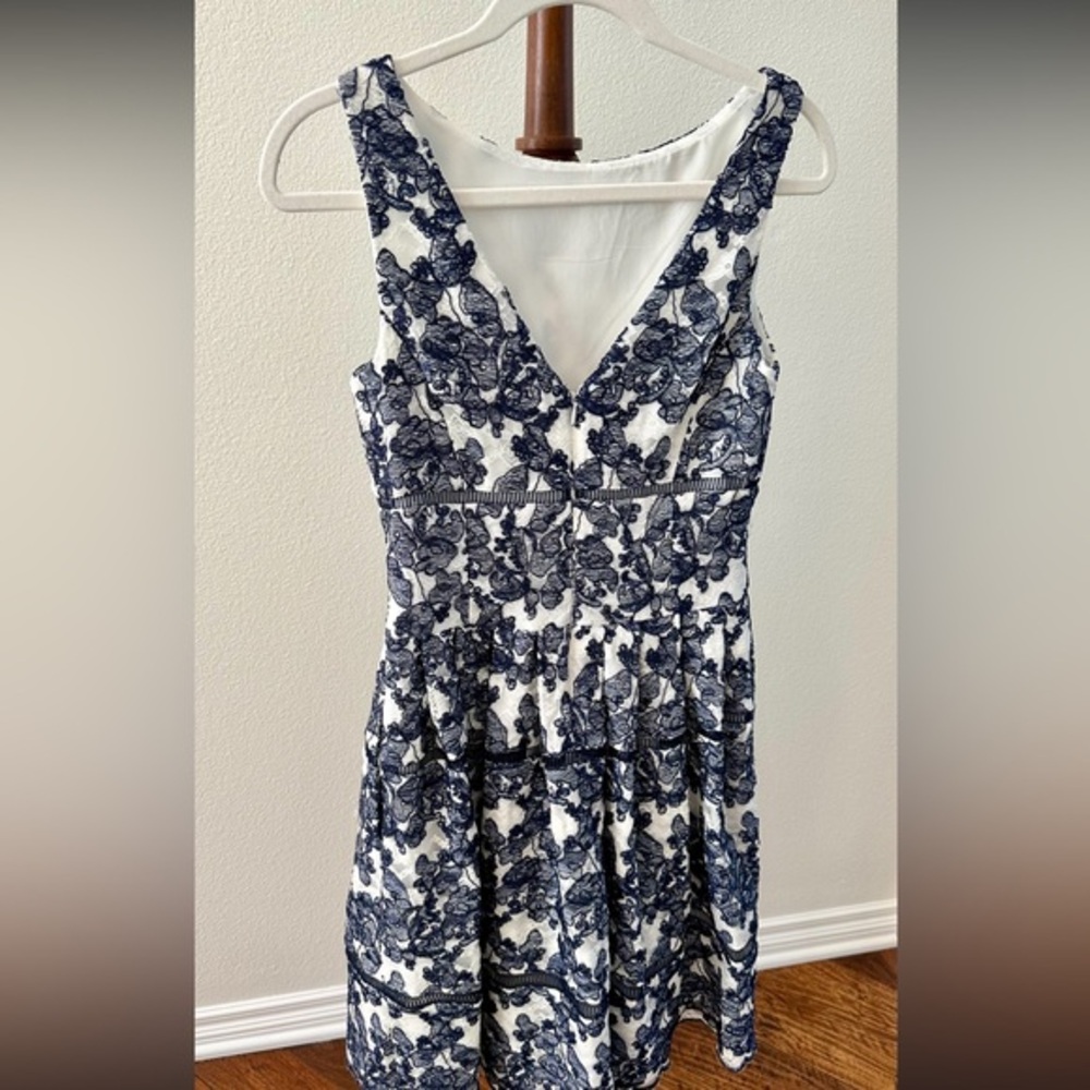 Eliza J navy and cream lace cocktail dress
Size 2